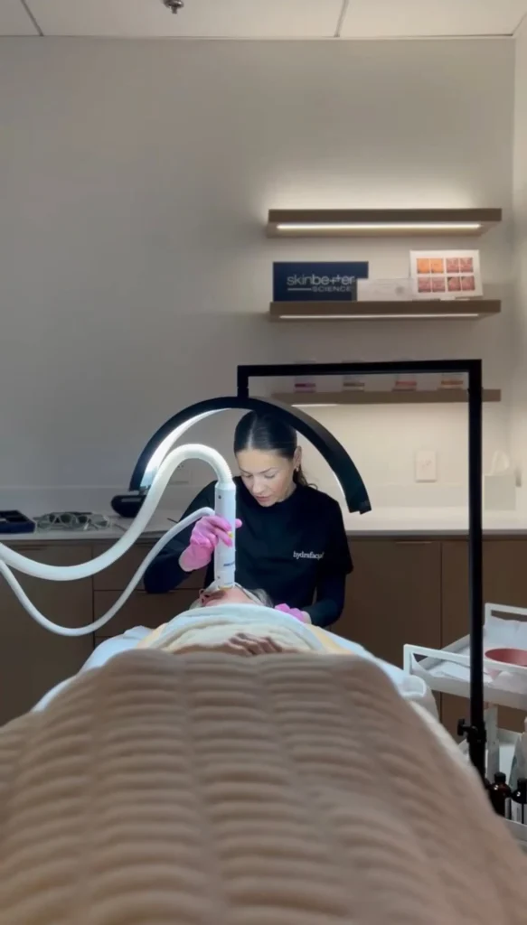 Woman receiving Aerolase ClearSkin Peel treatment at Mad Skin in Lehi, UT.